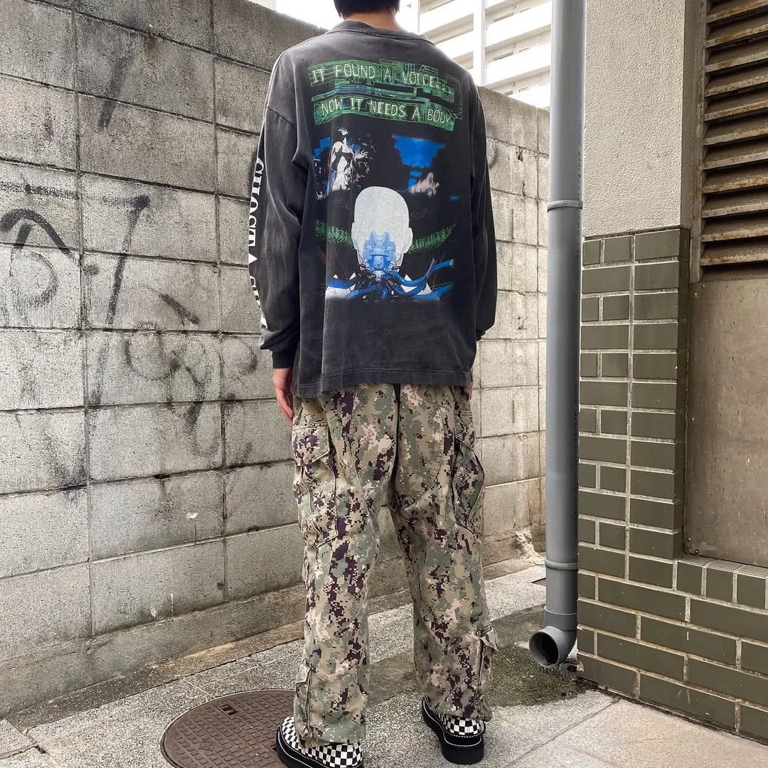 SAINT Mxxxxxx × GHOST IN THE SHELL Ghost in the Shell GS_LS TEE/GITS/BLK Big IP Ghost in the Shell co-branded model Sleeping Motoko Kusanagi Retro distressed long sleeves Washed black S-XL Ready-to-wear Assute dyeing Full-body spray fade/replacement fade Correct accessories Joint LOGO wash mark/main mark/cherub mark Super complex printing replica The drawing/pattern making cycle is very long and the hand graffiti is dirty.